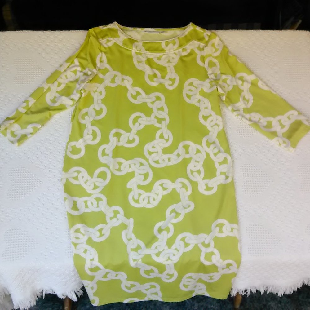 Lime green sheath dress with white chain link style print